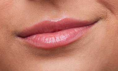 Beauty woman lips smile contempt close-up clipart