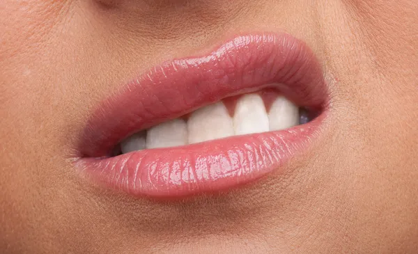 Beauty woman lips anger emotions close-up — Stock Photo, Image