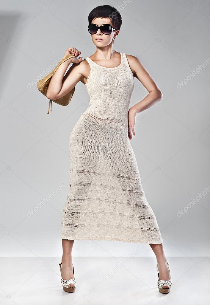 Fashion girl in a beautiful dress