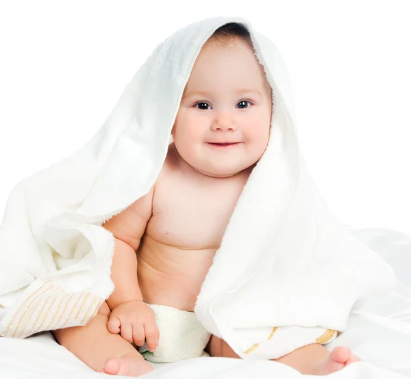 Маленький ребенок в полотенце — стоковое фото