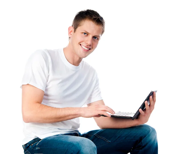 Smart guy with a laptop — Stock Photo, Image
