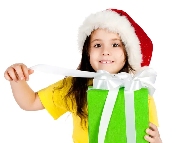 Дівчина з подарунками в капелюсі Санта — стокове фото