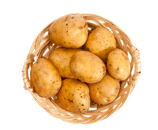 Potatoes in a wicker basket — Stock Photo, Image