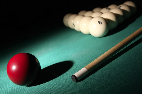 stock image Billiard balls with cue on light beam.