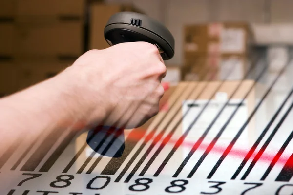 Barcode scanner and label close-up. — Stock Photo, Image