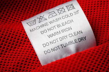 Laundry care label on white background clipart