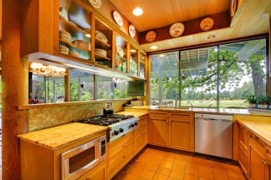 Kitchen on the horse ranch with nature views clipart