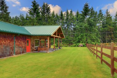 Cider house with covered deck and horse ranch clipart