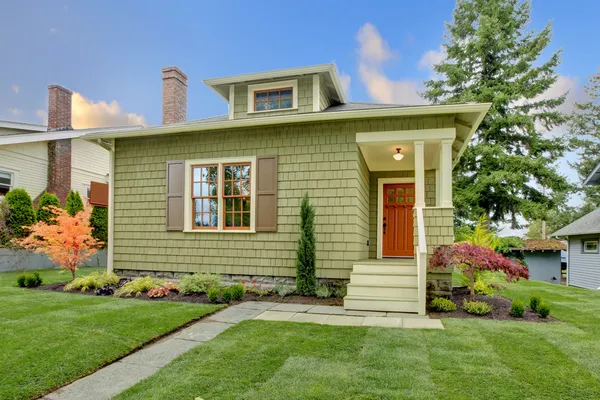 Green small craftsman style renovated house. — Stock Photo, Image