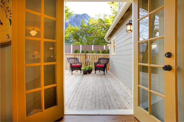 View of the deck from open kitchen french door — Stock Photo, Image