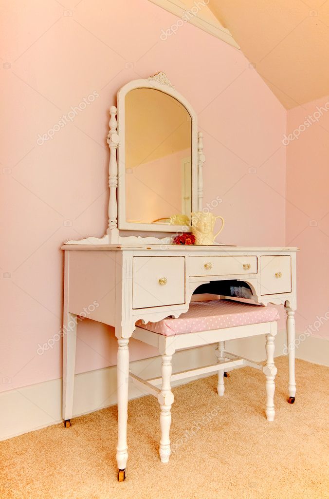 Pink Room With White Dresser Make Up Table With Mirror Stock