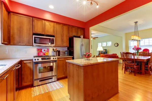 Red modern new kitchen with beautiful wood. — Stock Photo, Image
