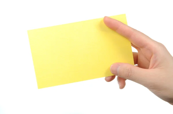 Cartão de visita rosa vazio na mão de uma mulher — Fotografia de Stock