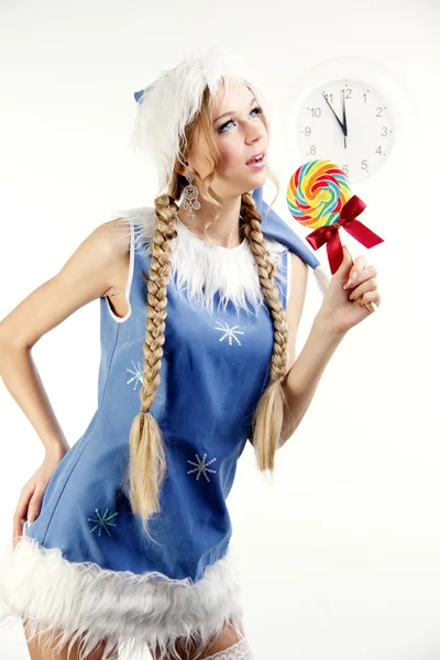 Pretty snow maiden holding bright lollipop — Stock Photo, Image