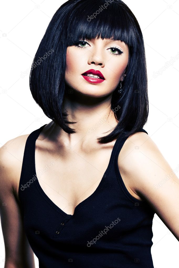 Beautiful girl with perfect skin, red lipstick and black hair on white back