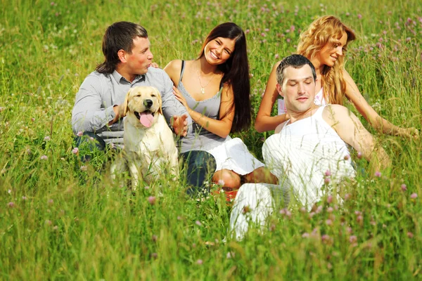 Friends and dog — Stock Photo, Image