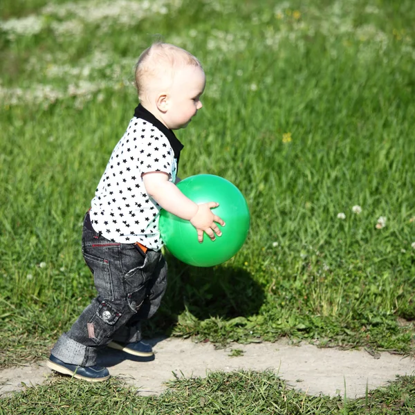 Boy in grass — Stock Photo, Image