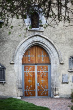 Door in stone wall clipart
