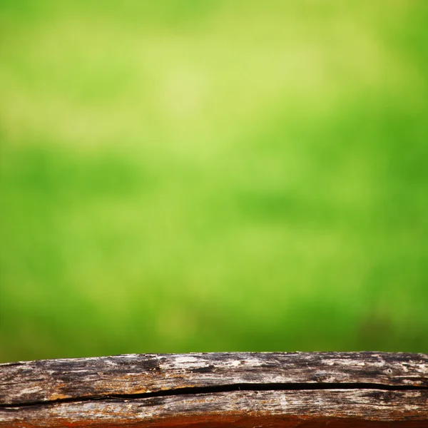 Wood in grass — Stock Photo, Image