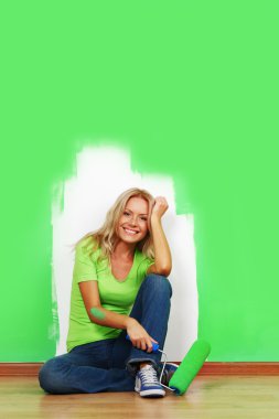 Woman paint on wall clipart