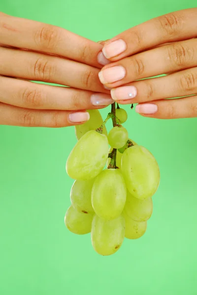 Grape in woman hands — Stock Photo, Image