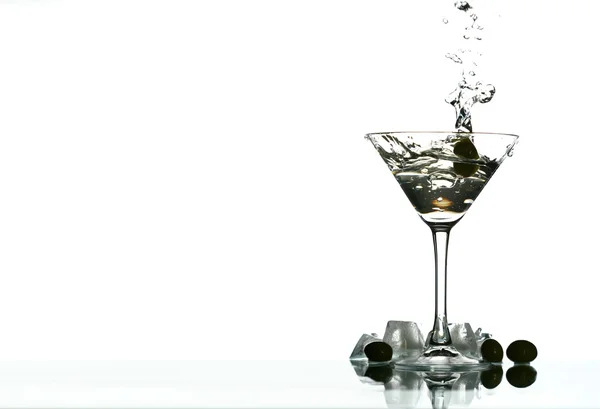 Martini glas splash — Stockfoto