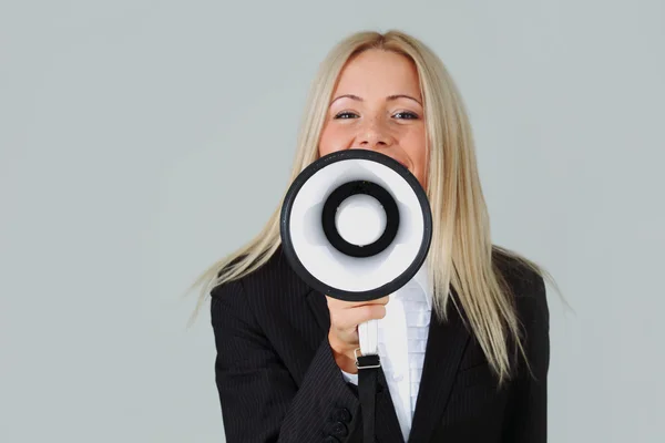 Businesswoman with megaphone — Stock Photo, Image