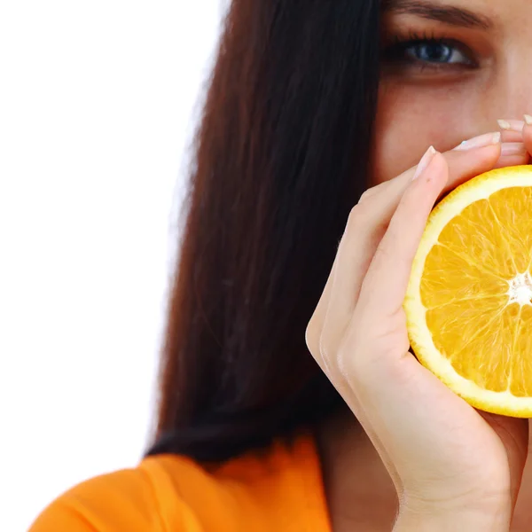 Orange in woman hands — Stock Photo, Image