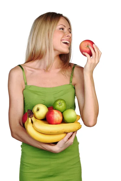 Жінка тримає купу фруктів — стокове фото