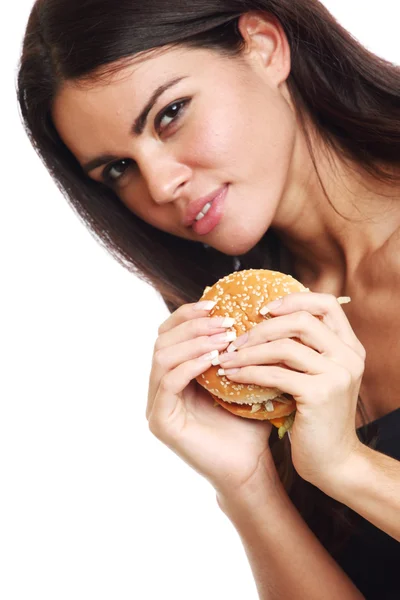 Kadın hamburger yemek — Stok fotoğraf