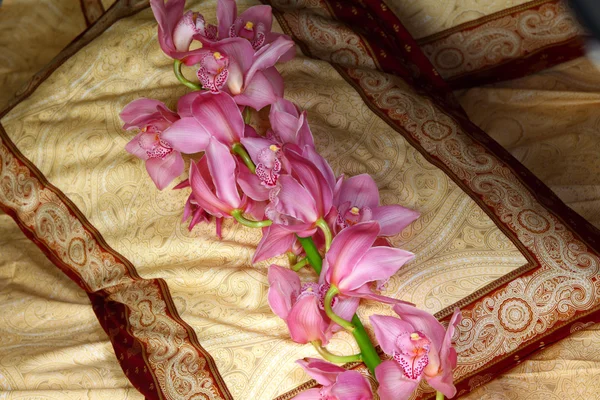 Orchid on the pillow — Stock Photo, Image