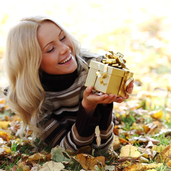 Woman take autumn gift — Stock Photo, Image
