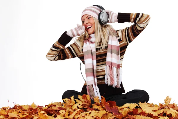 Autumn woman listening music — Stock Photo, Image