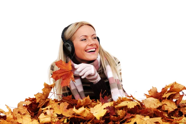 Autumn woman listening music Stock Picture