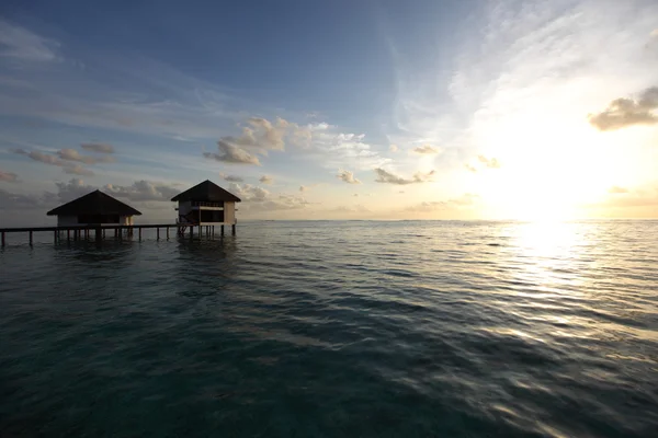 A sunrise Maldív házak — Stock Fotó