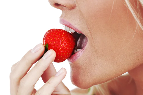 Woman eat strawberry — Stock Photo, Image