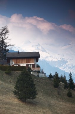 Chalet in mountains clipart