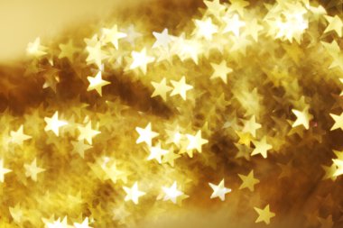 Golden star bokeh background clipart