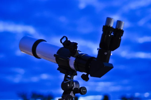 stock image Astronomical telescope in the blue night sky