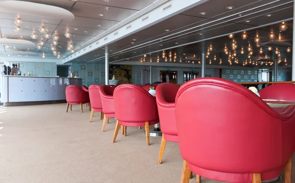 stock image Leather chairs and wooden tables in the restaurant