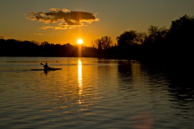 Sunset over lake Wascana clipart