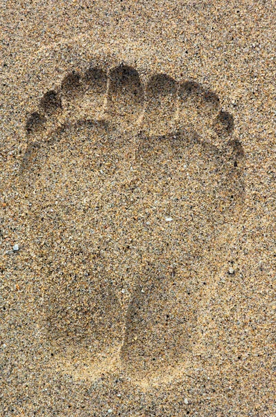 stock image Foot prints on the sand