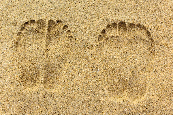 stock image Foot prints on the sand