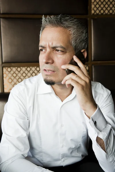 Portrait of a young businessman using his mobile phone — Stock Photo, Image