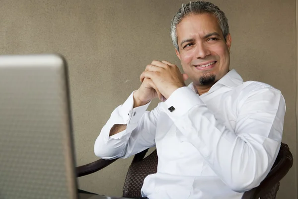 Portrait of a handsome indian businessman with grey hair — Stock Photo, Image