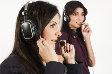 Portrait of a female customer services operator clipart