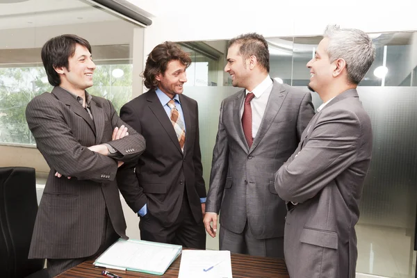 Geschäftsleute in der Sitzung — Stockfoto