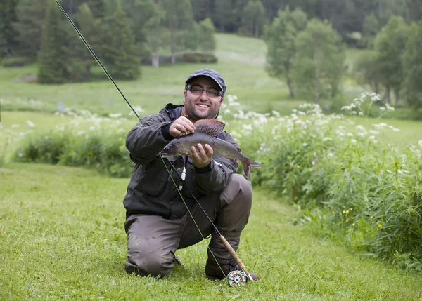Fishing happiness Royalty Free Stock Images