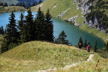 Hikers in the Alps clipart