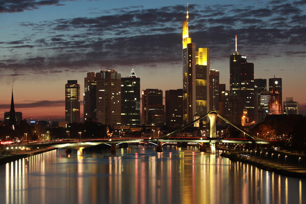 Skyline of the German financial center Frankfurt in the evening